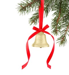 Photo of Christmas bell with red bow hanging on fir tree branch against white background