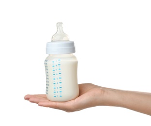 Photo of Woman holding baby bottle with milk on white background