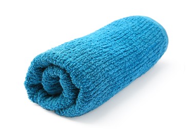 Photo of Rolled blue terry towel isolated on white