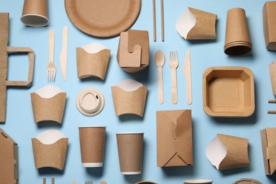 Flat lay composition with eco friendly food packagings on light blue background