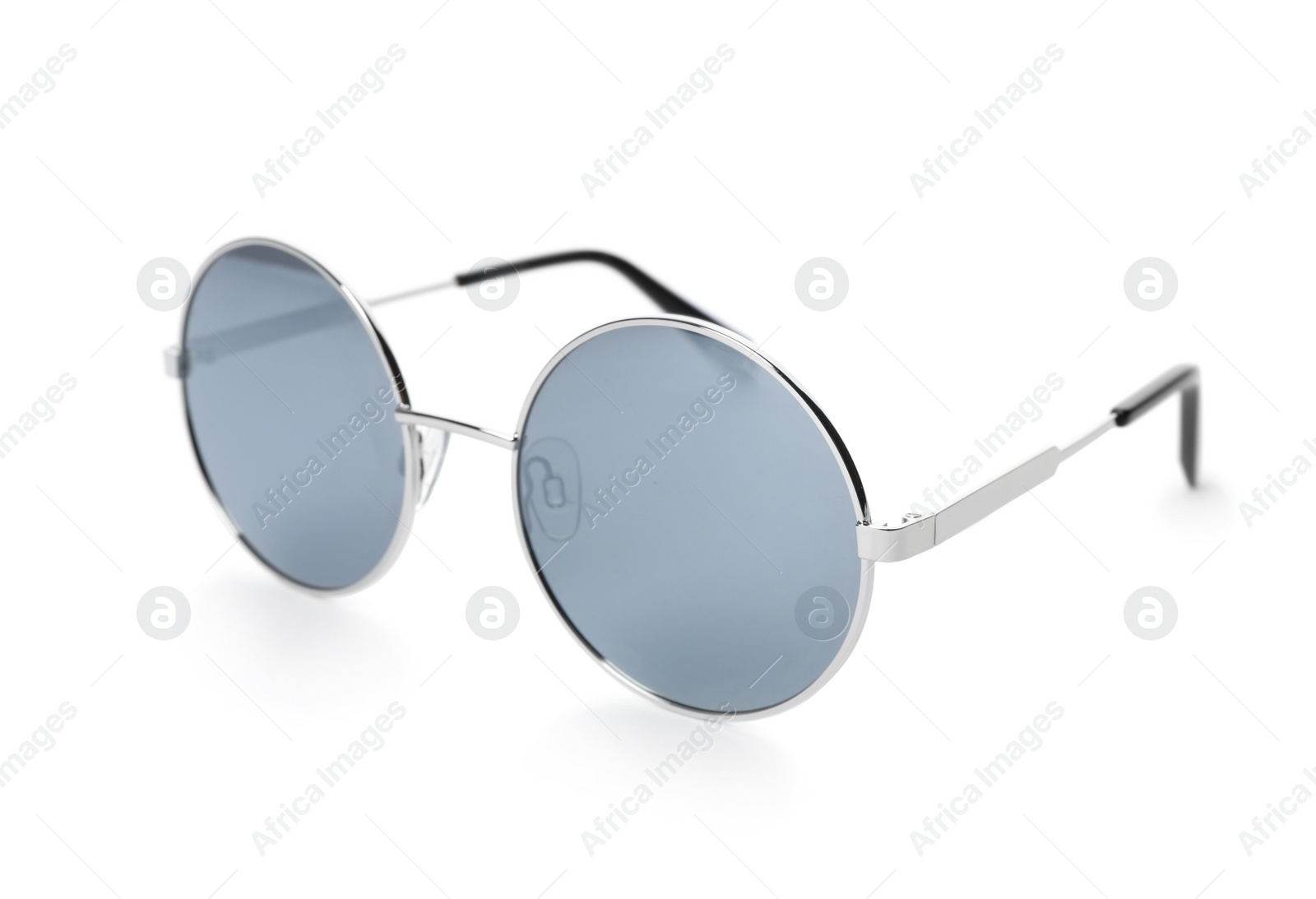 Photo of Stylish sunglasses on white background. Trendy eyewear