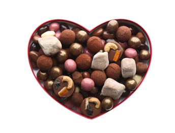 Delicious chocolate candies in heart shaped box on white background, top view