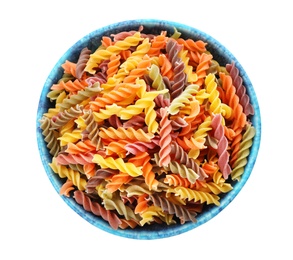 Photo of Bowl with uncooked fusilli pasta on white background, top view