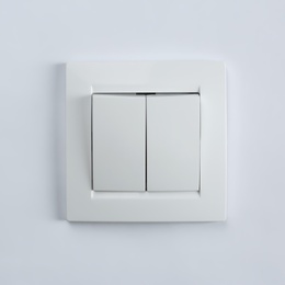 Photo of Light switch on white background. Electrician's equipment