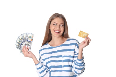 Portrait of happy young woman with money and credit card on white background