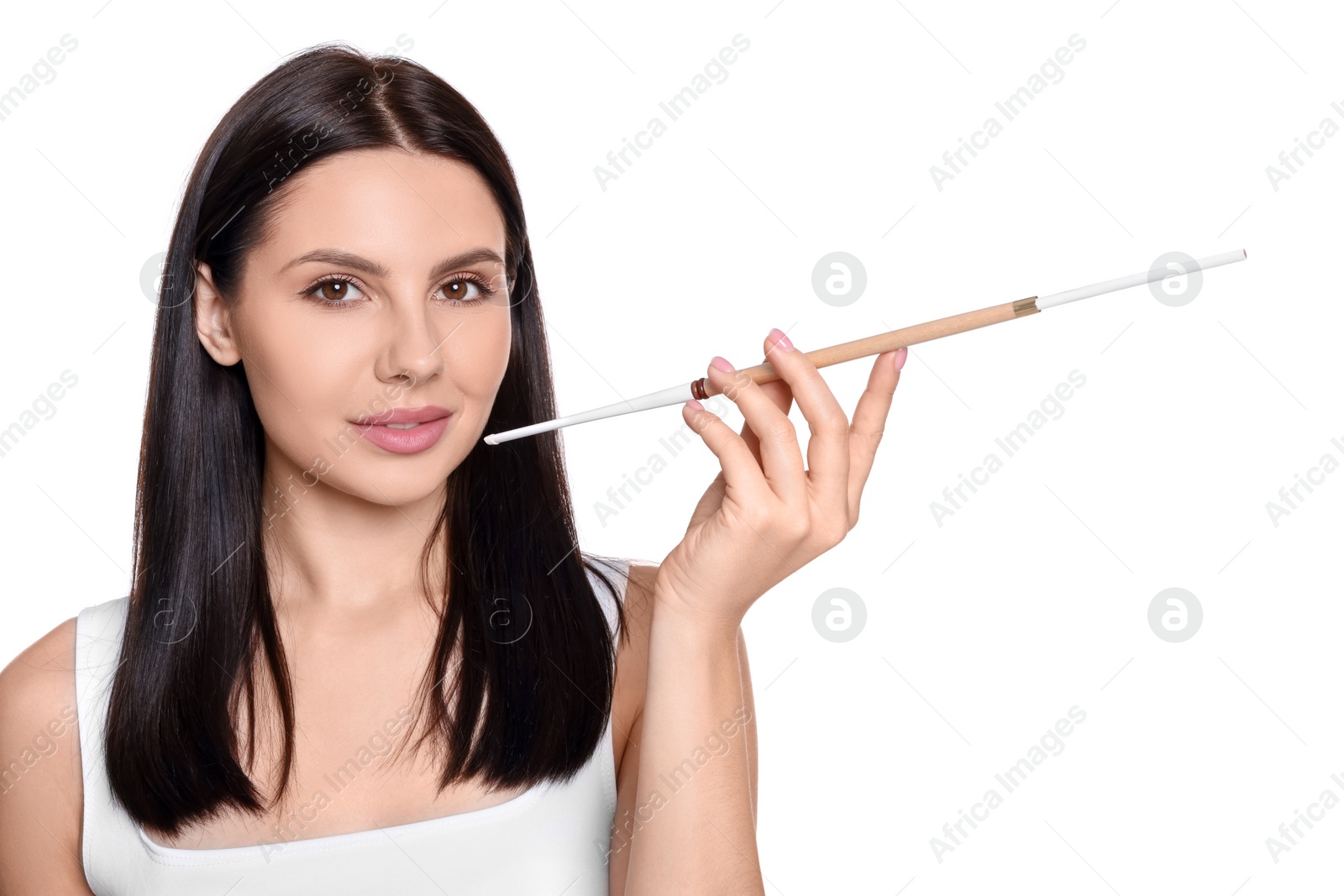 Photo of Woman using long cigarette holder for smoking isolated on white