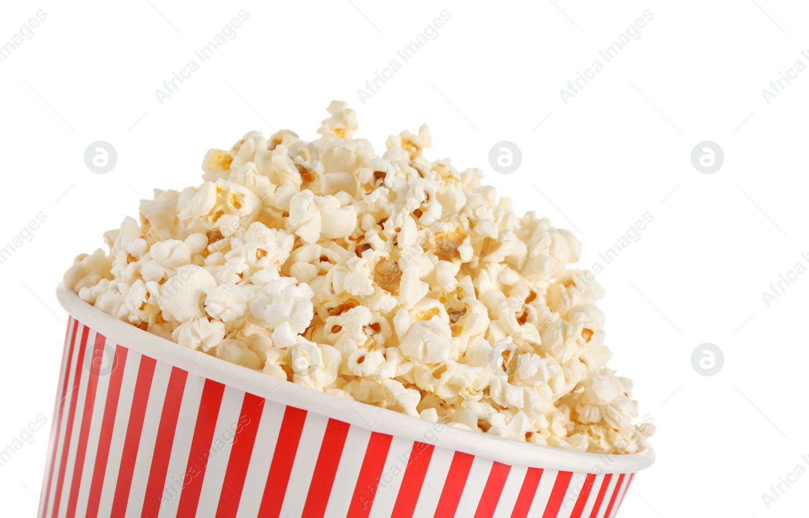 Photo of Delicious popcorn in paper bucket isolated on white, closeup