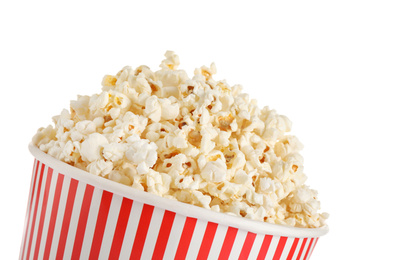 Delicious popcorn in paper bucket isolated on white, closeup