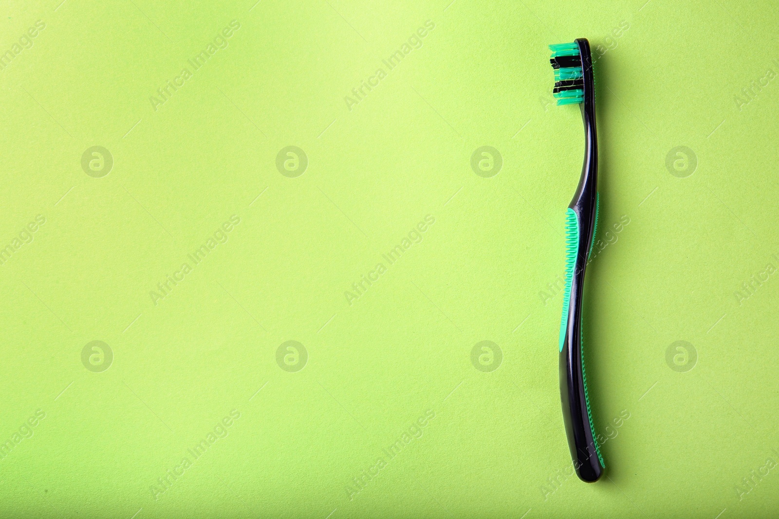 Photo of Manual toothbrush on color background. Dental care