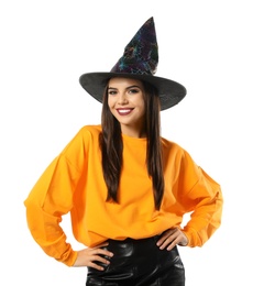 Photo of Beautiful young woman wearing witch costume for Halloween party on white background