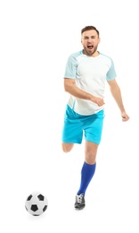 Young man playing football on white background