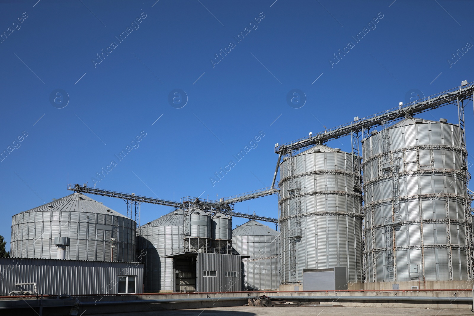 Photo of View of modern granaries for storing cereal grains outdoors