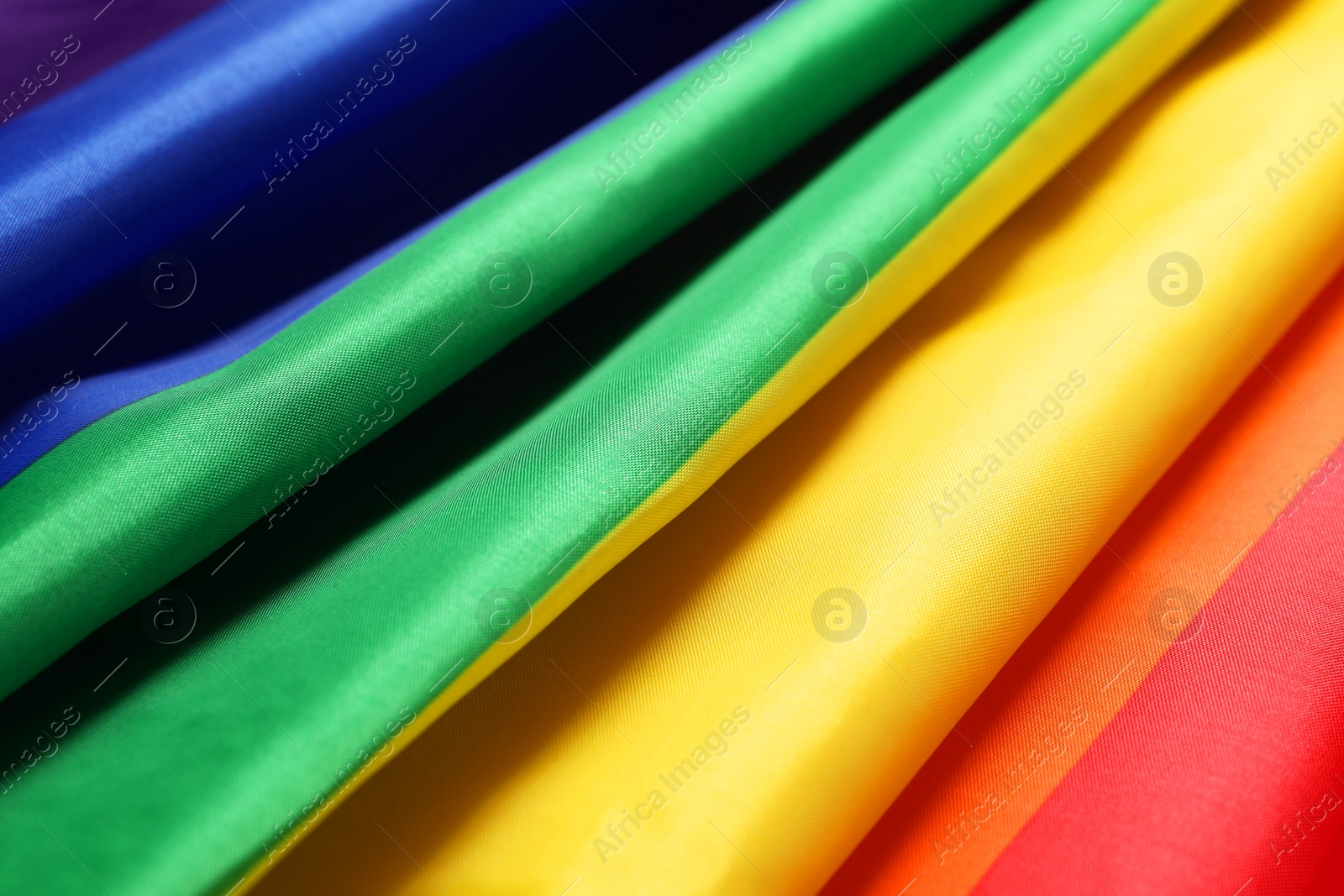 Photo of Rainbow LGBT flag as background, closeup view