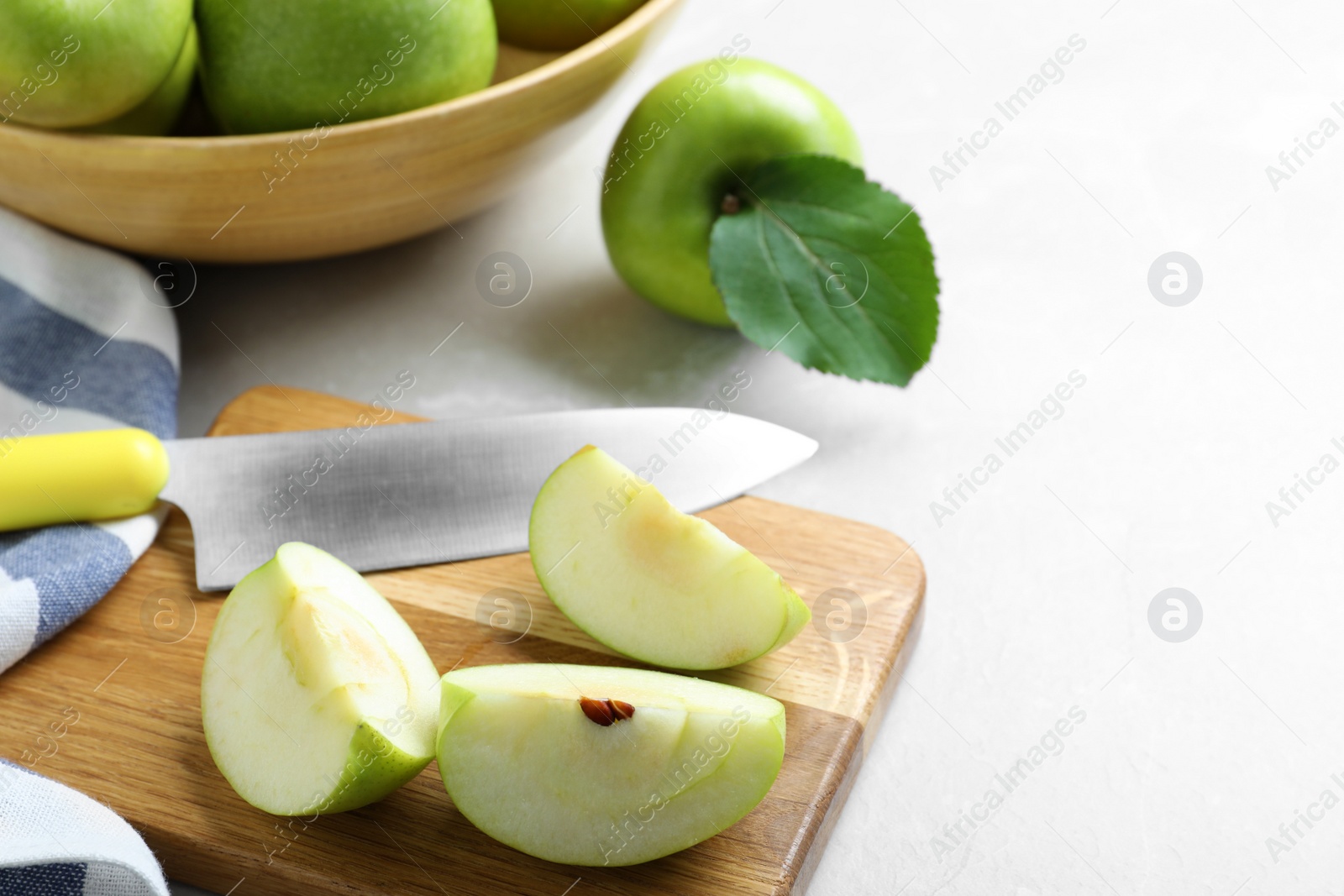 Photo of Composition with juicy green apples on white table, space for text