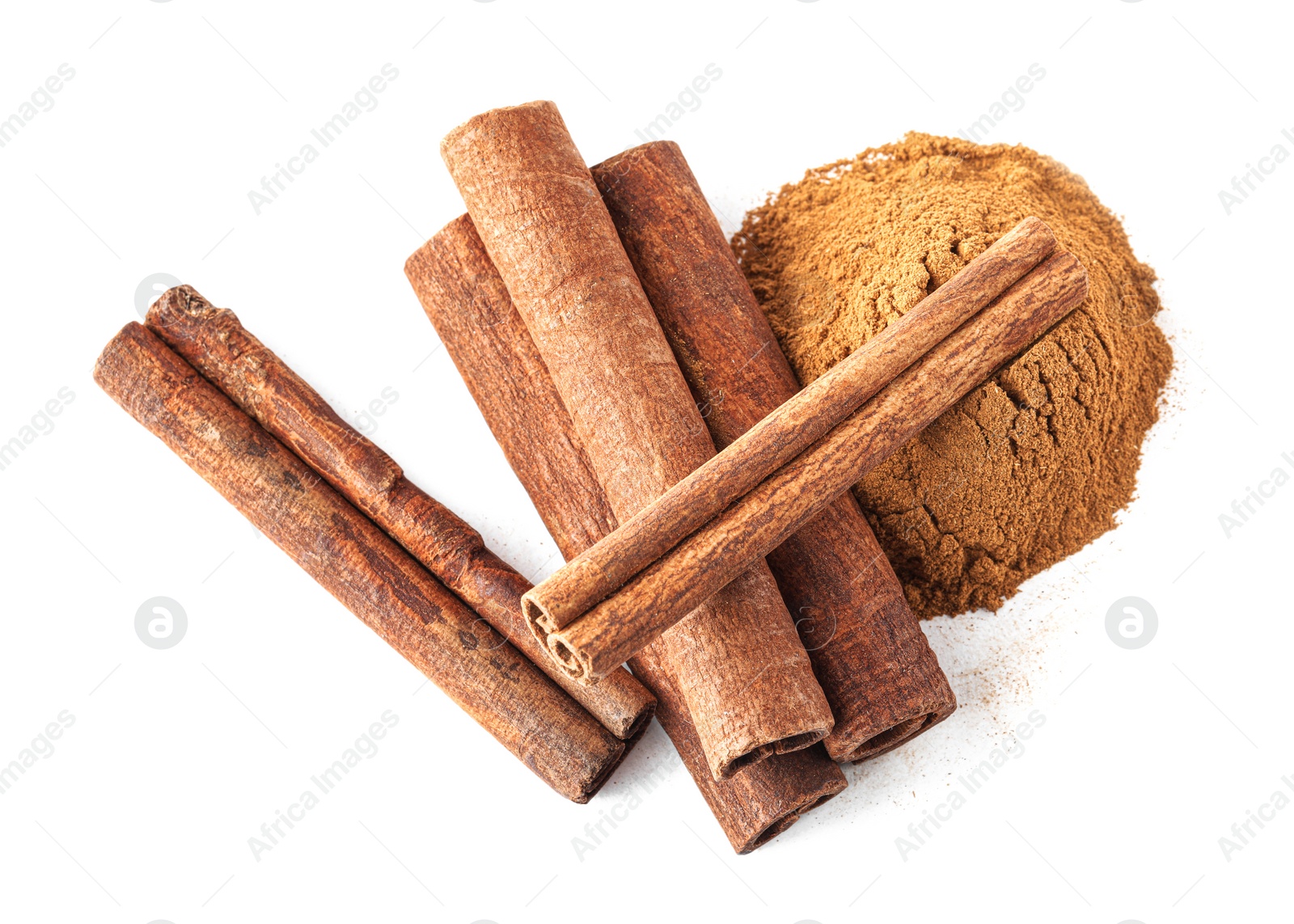 Photo of Dry aromatic cinnamon sticks and powder isolated on white, top view