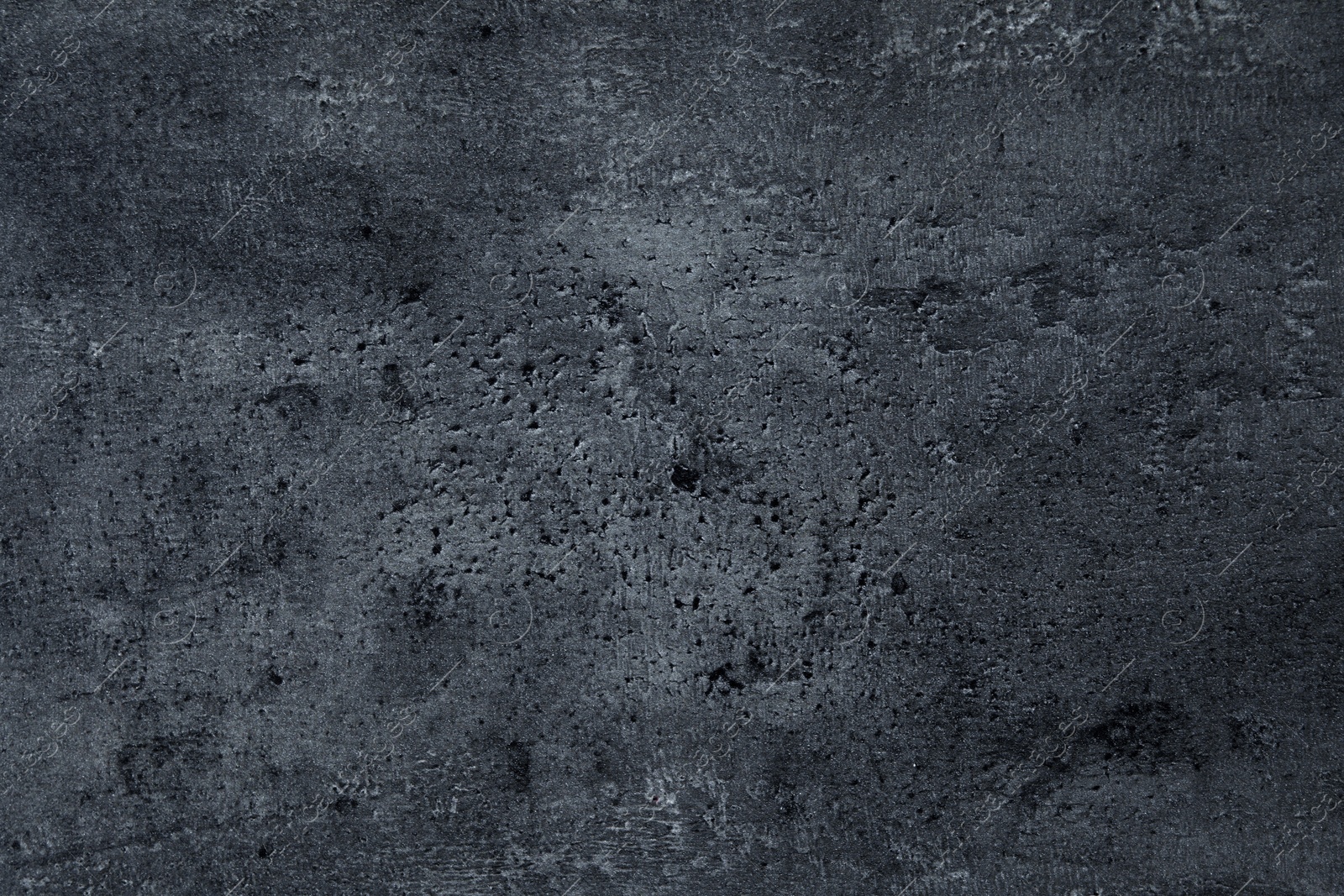 Image of Texture of dark grey stone surface as background, closeup