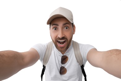 Smiling man taking selfie on white background