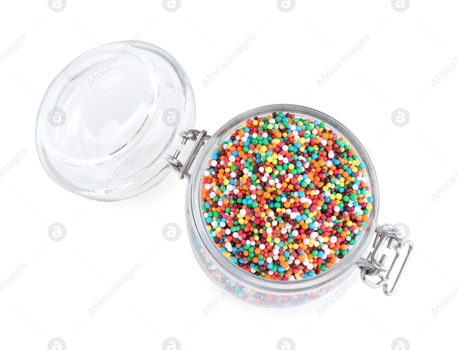 Photo of Colorful sprinkles in jar on white background, top view. Confectionery decor