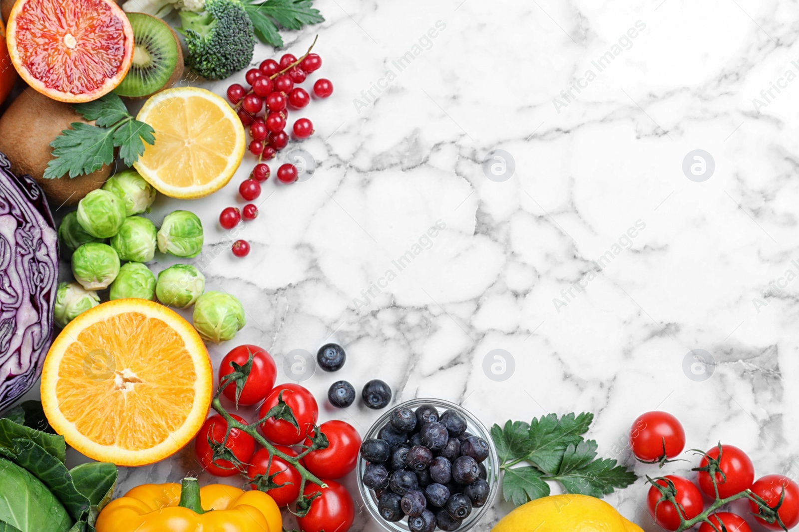 Photo of Different products rich in vitamin C on white marble table, flat lay. Space for text