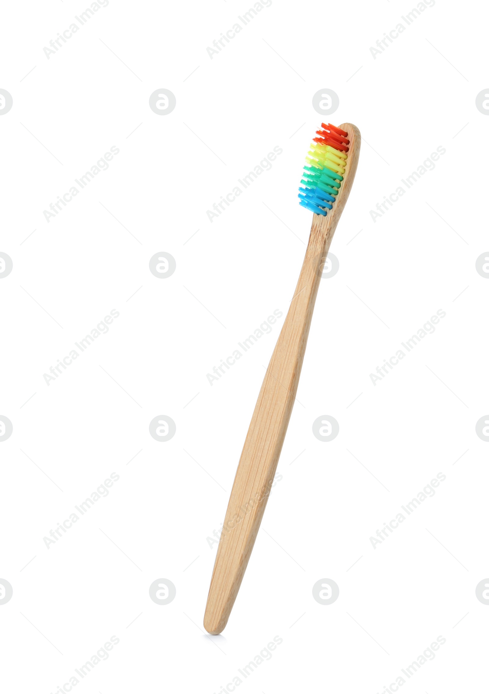 Photo of Bamboo toothbrush on white background. Dental care