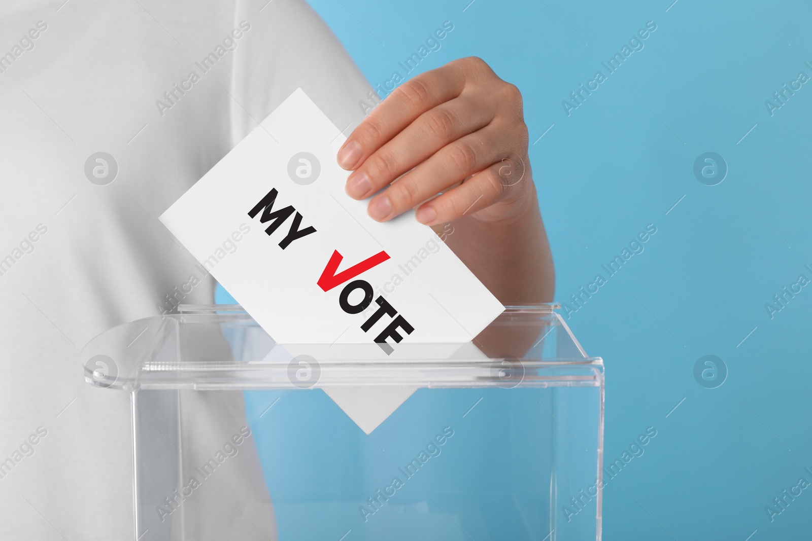 Image of Woman putting paper with text My Vote and tick into ballot box on light blue background