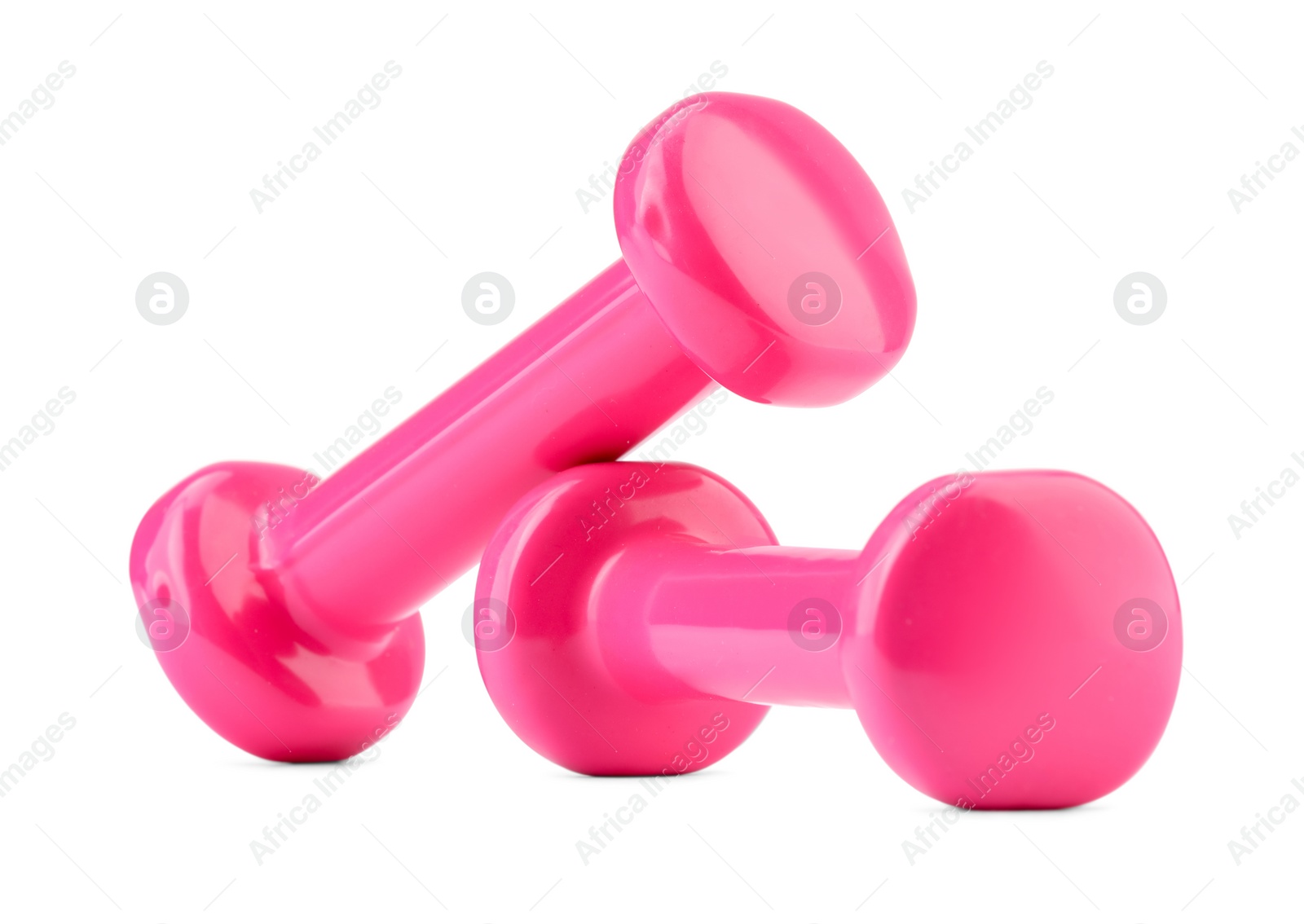 Photo of Pink dumbbells isolated on white. Sports equipment