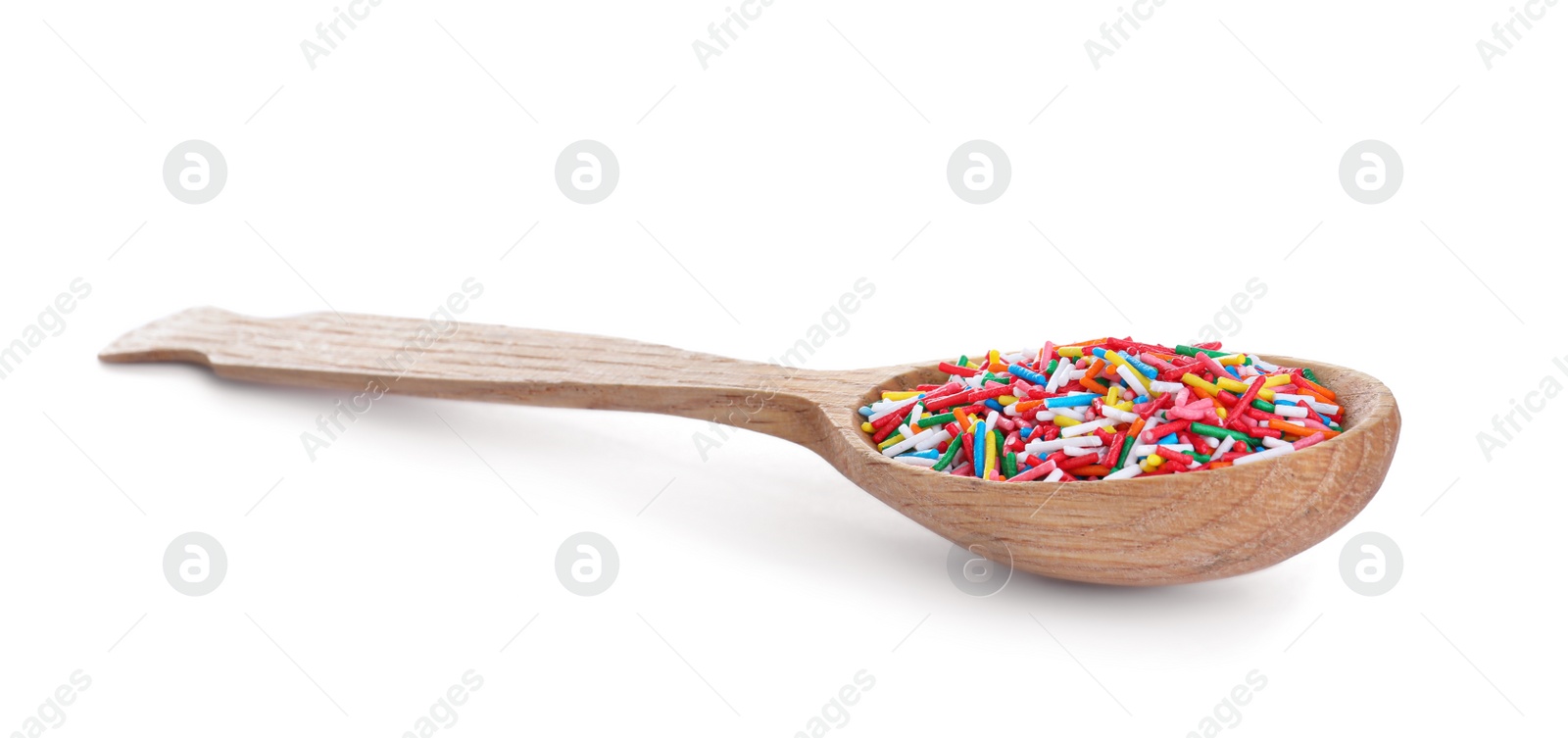 Photo of Colorful sprinkles in wooden spoon on white background. Confectionery decor