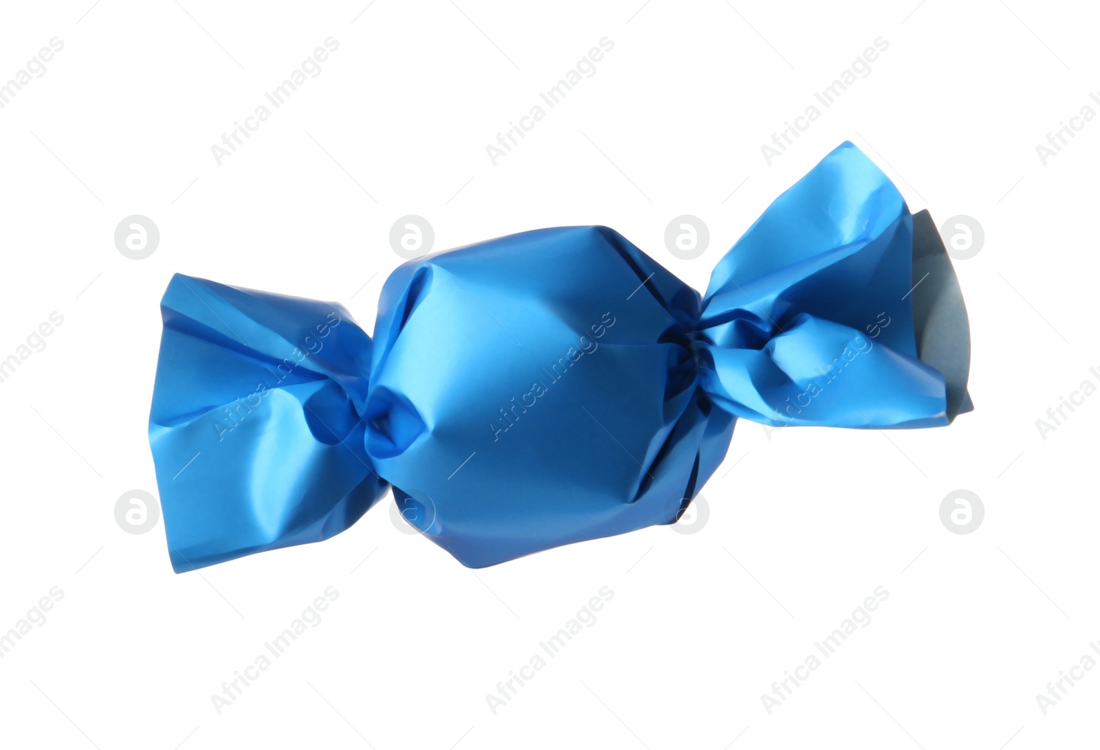 Photo of Delicious candy in light blue wrapper isolated on white