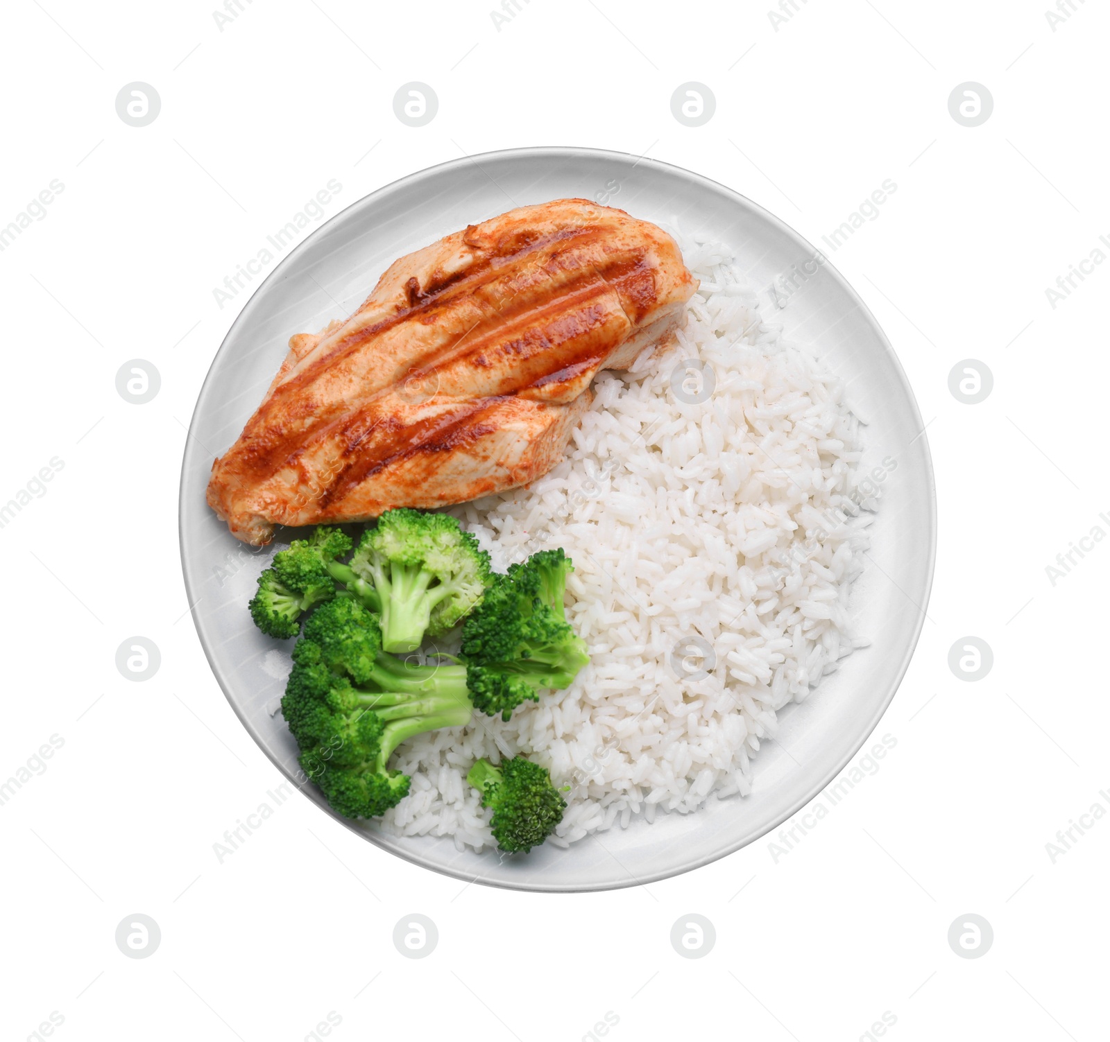 Photo of Plate with grilled chicken breast, rice and broccoli isolated on white, top view