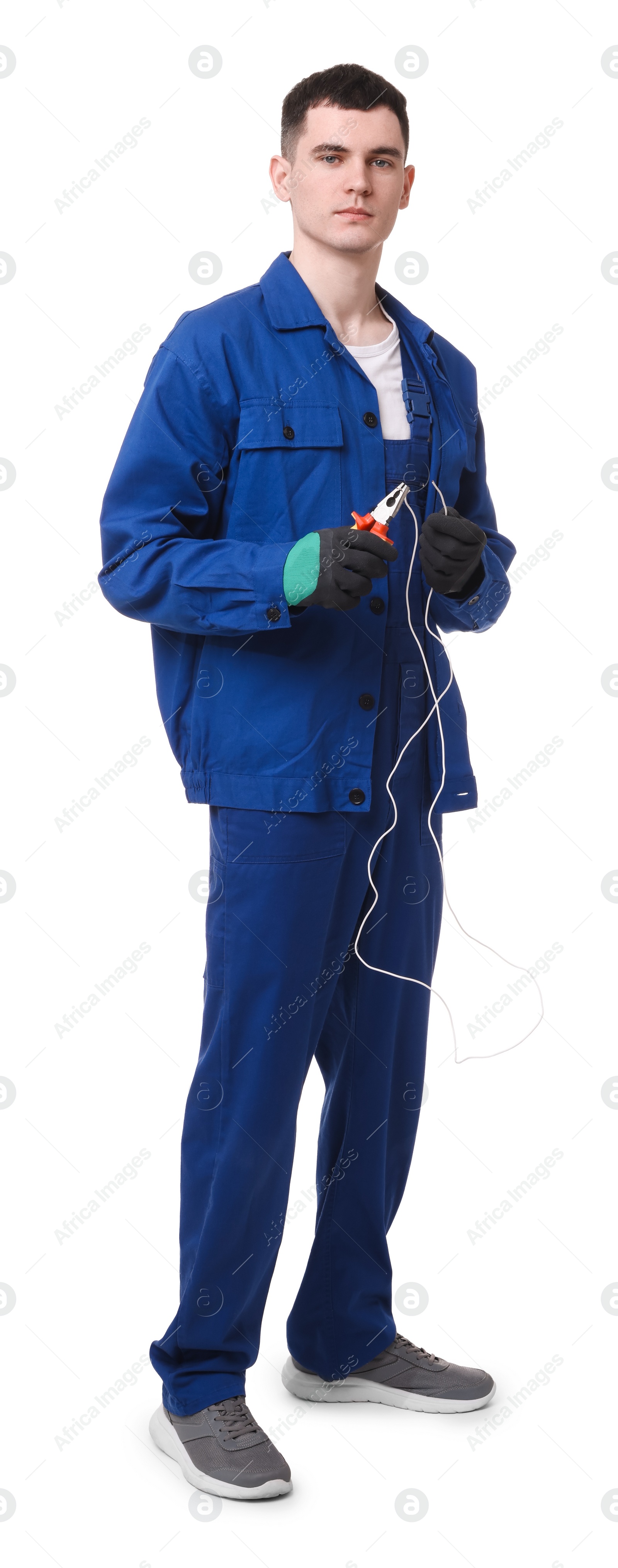 Photo of Young man holding pliers on white background