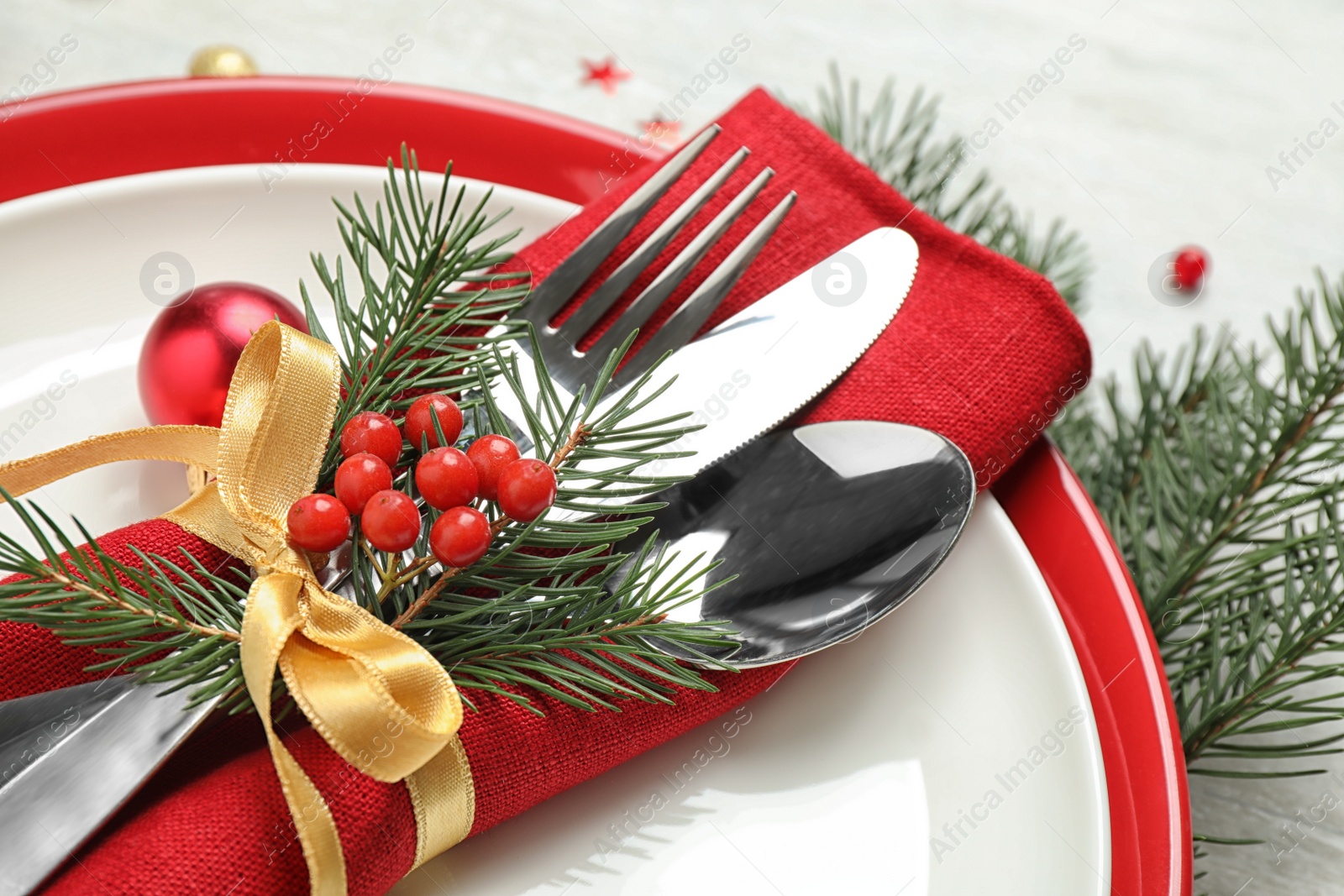 Photo of Christmas table setting on white background, closeup