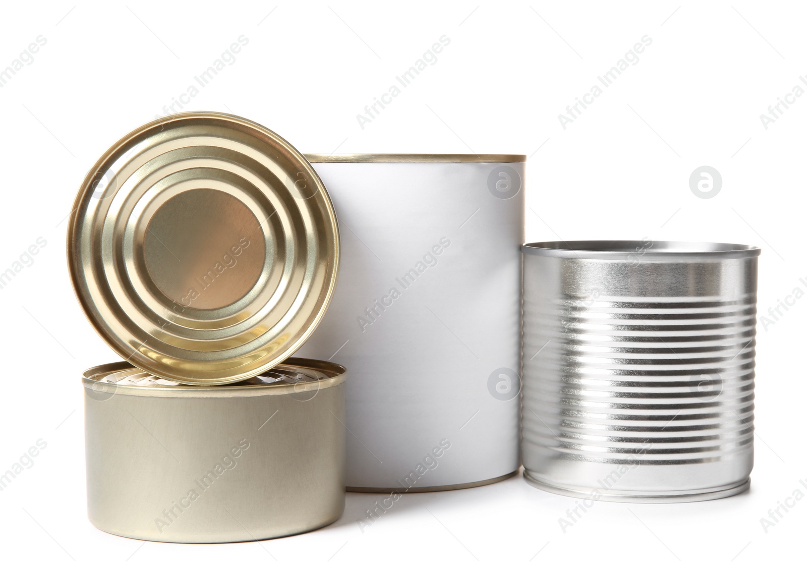 Photo of Closed tin cans isolated on white, mockup for design