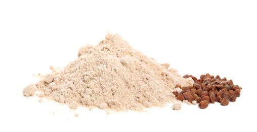 Photo of Pile of buckwheat flour and grains isolated on white