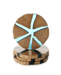 Stylish wooden cup coasters on white background