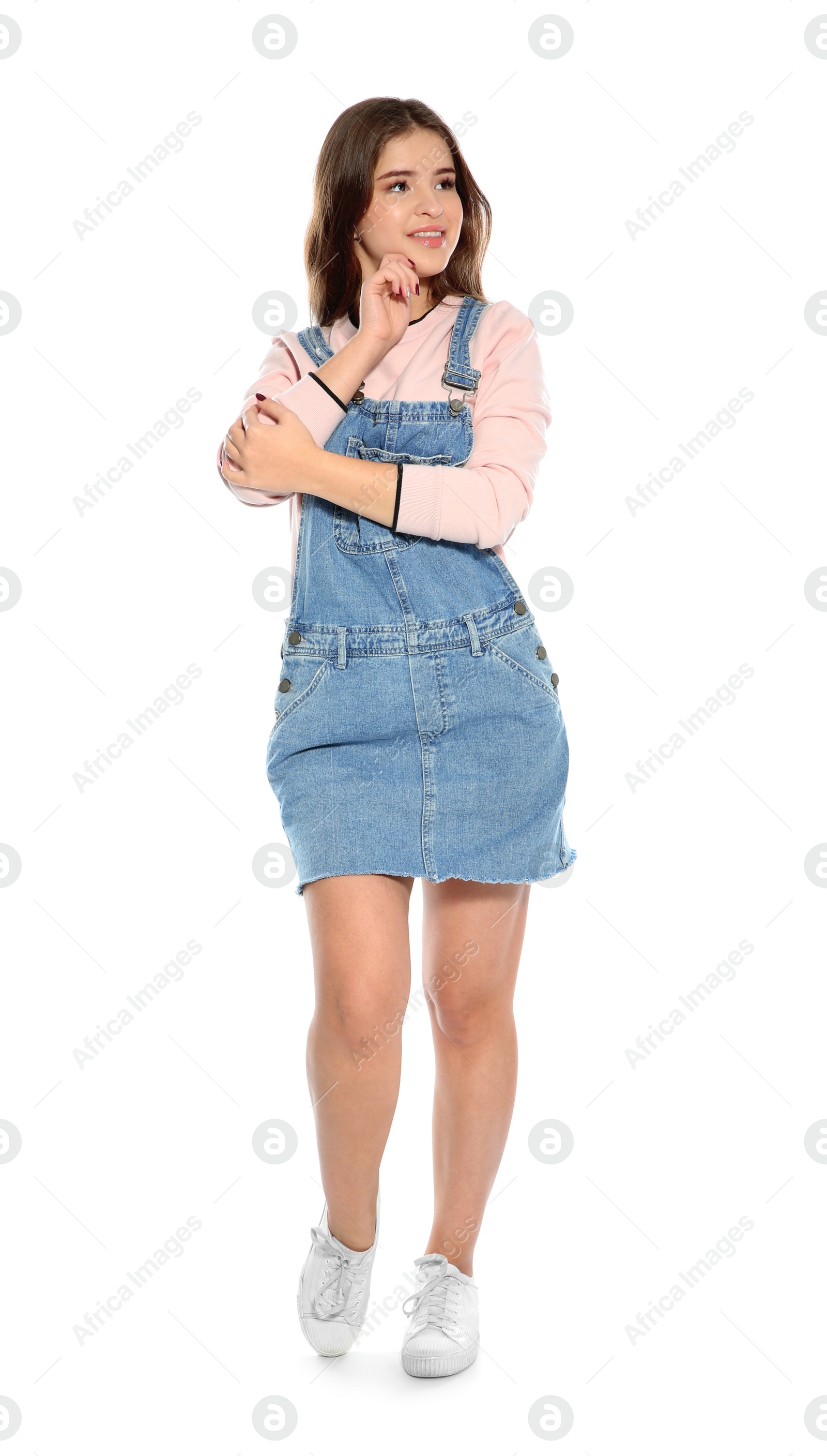 Photo of Beautiful teenage girl in stylish clothes on white background