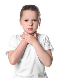 Photo of Little girl suffering from sore throat on white background