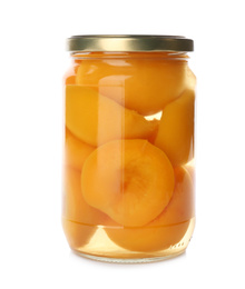 Glass jar with pickled peaches isolated on white