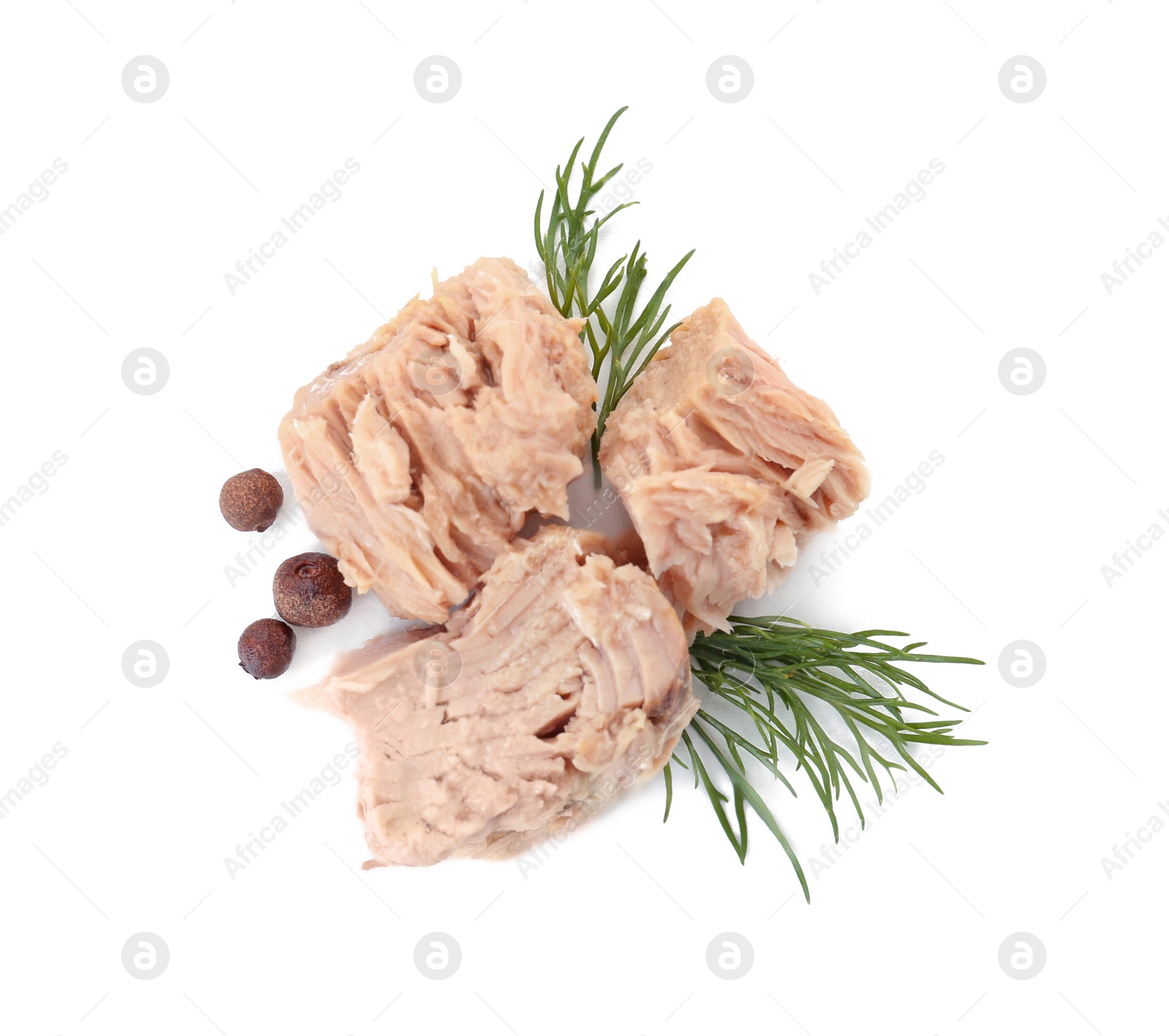 Photo of Delicious canned tuna chunks on white background, top view