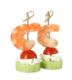 Tasty canapes with shrimps, vegetables and cream cheese isolated on white