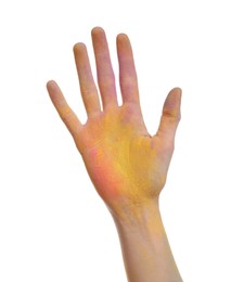 Photo of Woman covered with colorful powder dyes on white background, closeup of hand. Holi festival celebration
