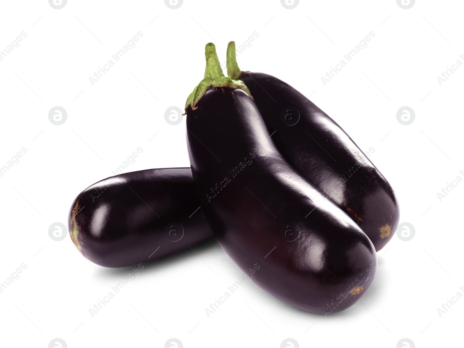 Photo of Tasty raw ripe eggplants on white background