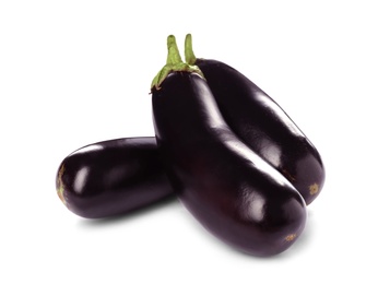 Photo of Tasty raw ripe eggplants on white background