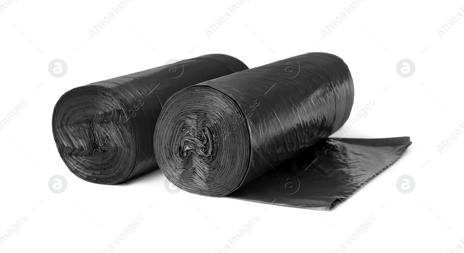 Photo of Rolls of black garbage bags isolated on white