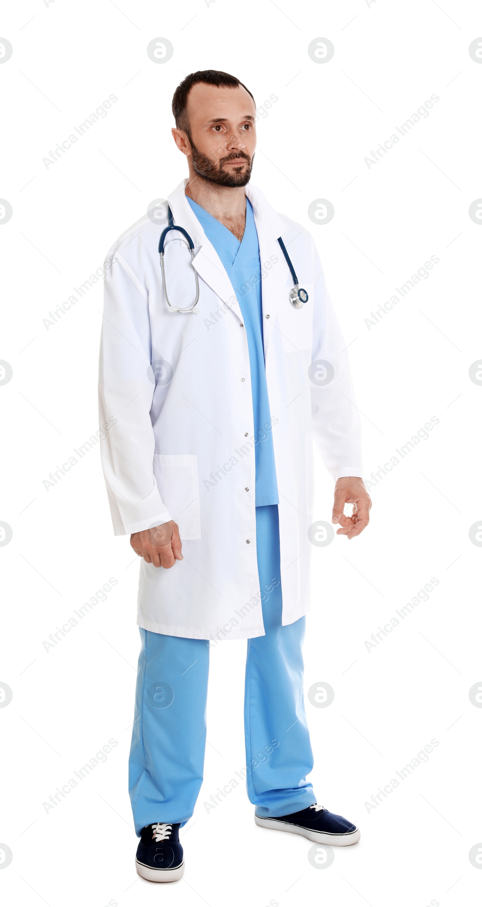 Photo of Full length portrait of male doctor isolated on white. Medical staff