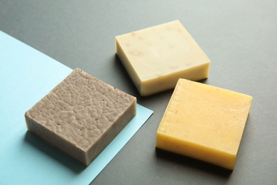 Photo of Hand made soap bars on color background