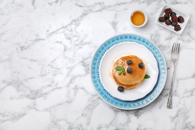 Photo of Flat lay composition with tasty pancakes on marble background