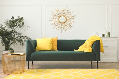 Photo of Stylish living room interior with comfortable green sofa