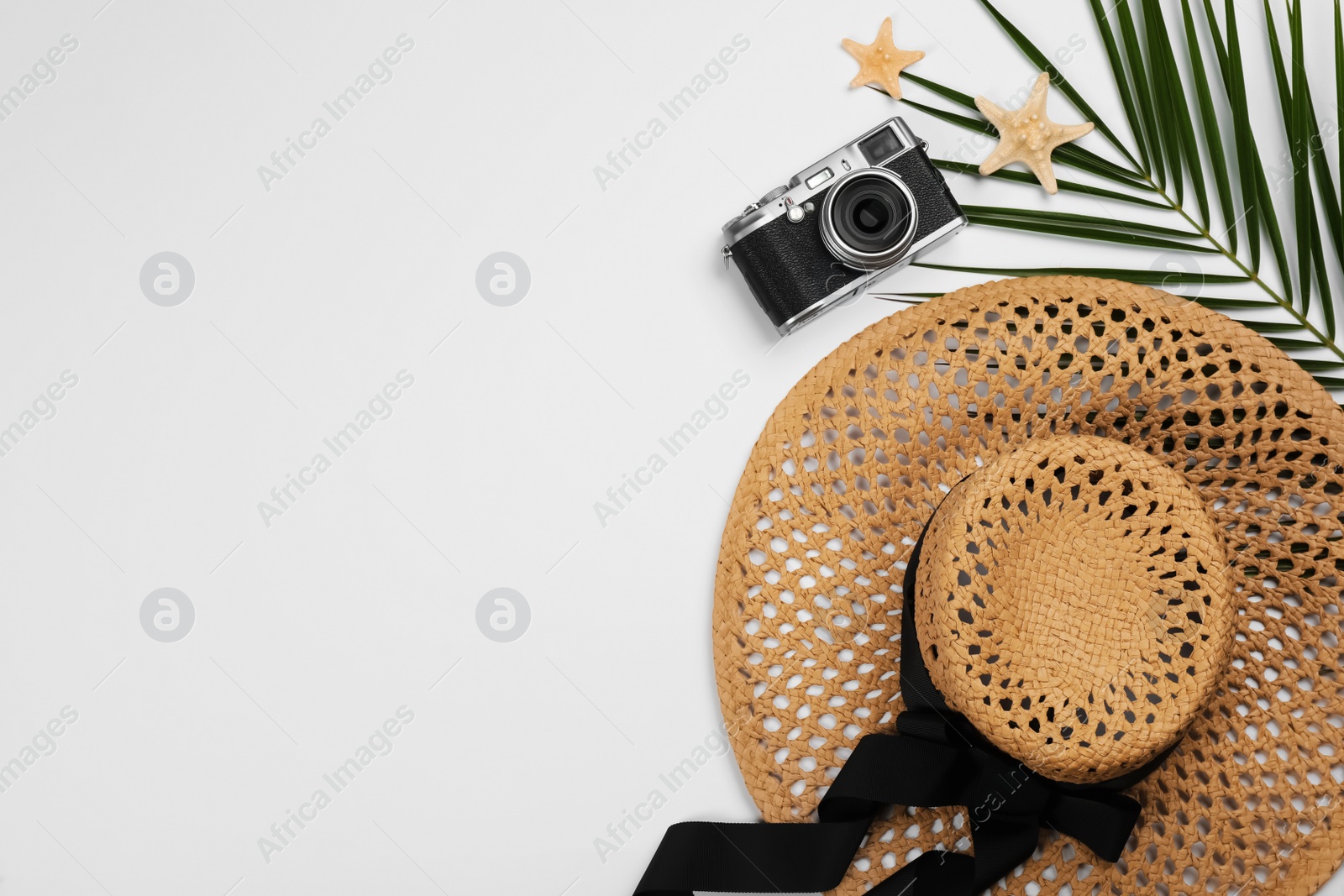 Photo of Flat lay composition with beach objects on white background, space for text