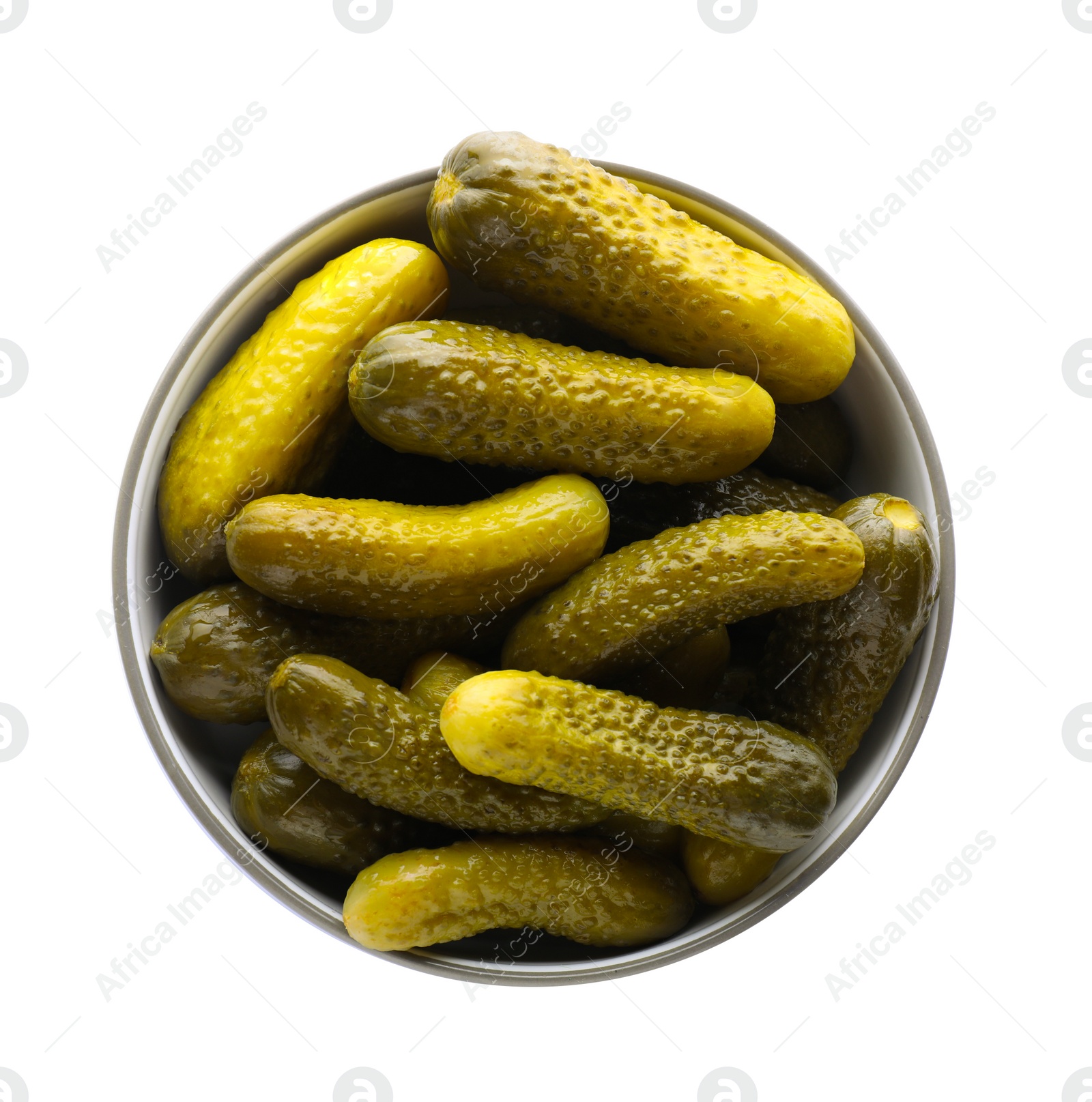 Photo of Bowl of tasty pickled cucumbers isolated on white, top view