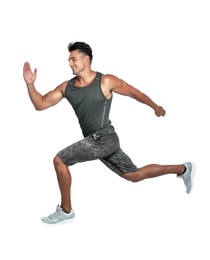 Photo of Handsome young man running on white background